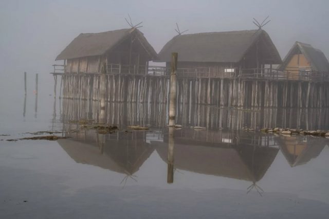 Pile dwellings on a foggy day in winter. Located at the lake of constance, world heritage site.